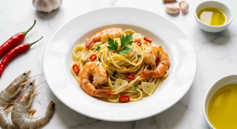 Räkor med linguine, vitlök och chili