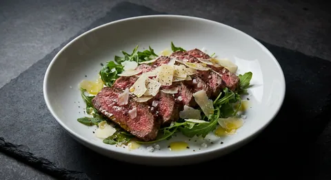 Tagliata med rucola och parmesan